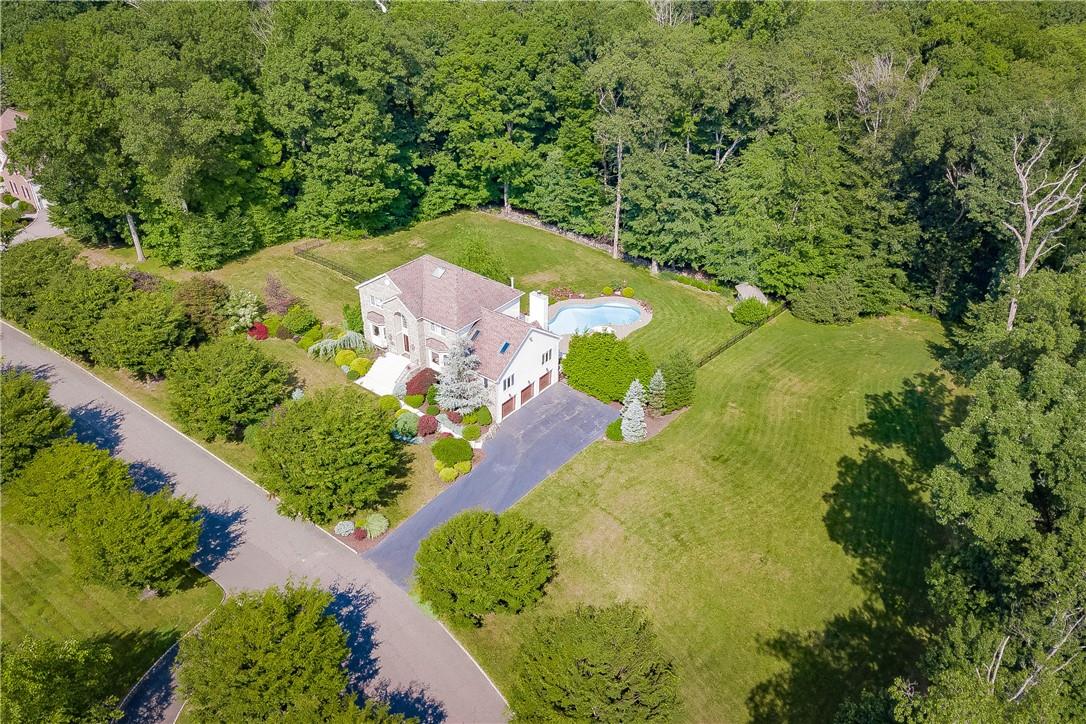 18 Coe Farm Road Montebello, NY 10901 - Photo 1 of 1 Beautifully landscaped and surrounded by lush trees.