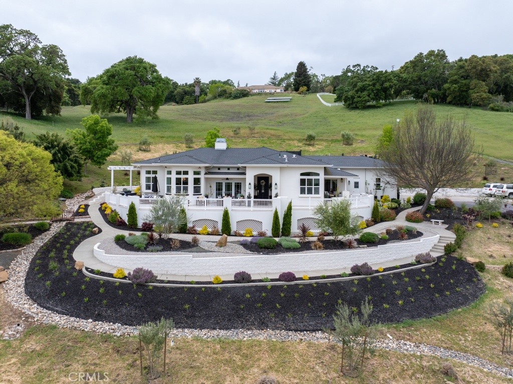 8560 Corriente Road Atascadero, CA 93422 - Photo 1 of 1 a view of a house with yard and lake view