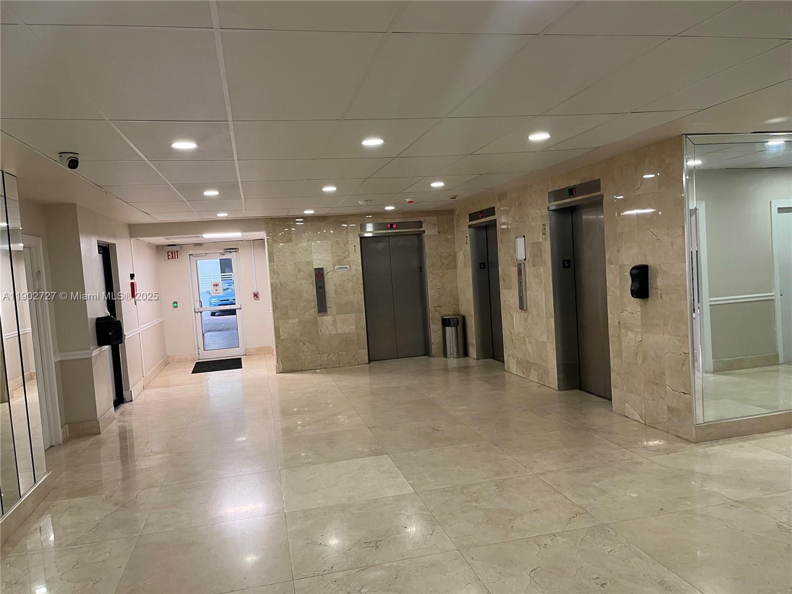 5005 Collins Avenue, Unit 923 Miami Beach, FL 33140 - Photo 12 of 17 a view of a hallway