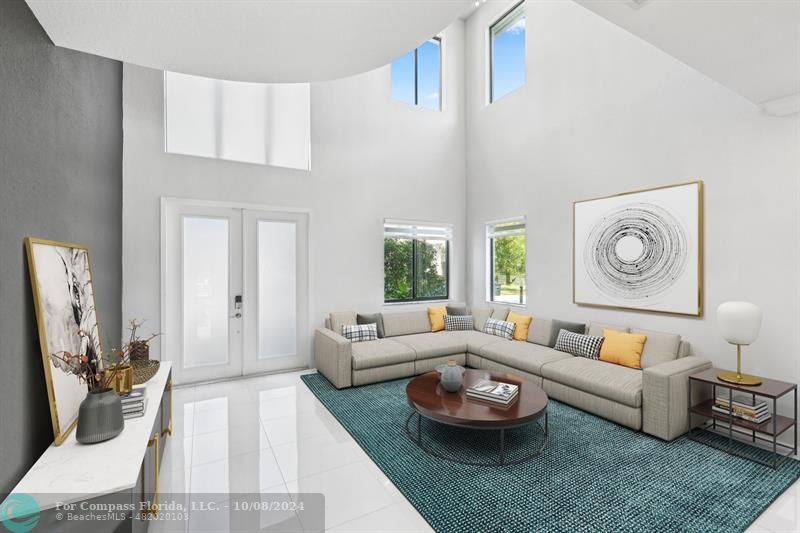 10610 Waves Way Parkland, FL 33076 - Photo 7 of 53 a living room with furniture and a large window