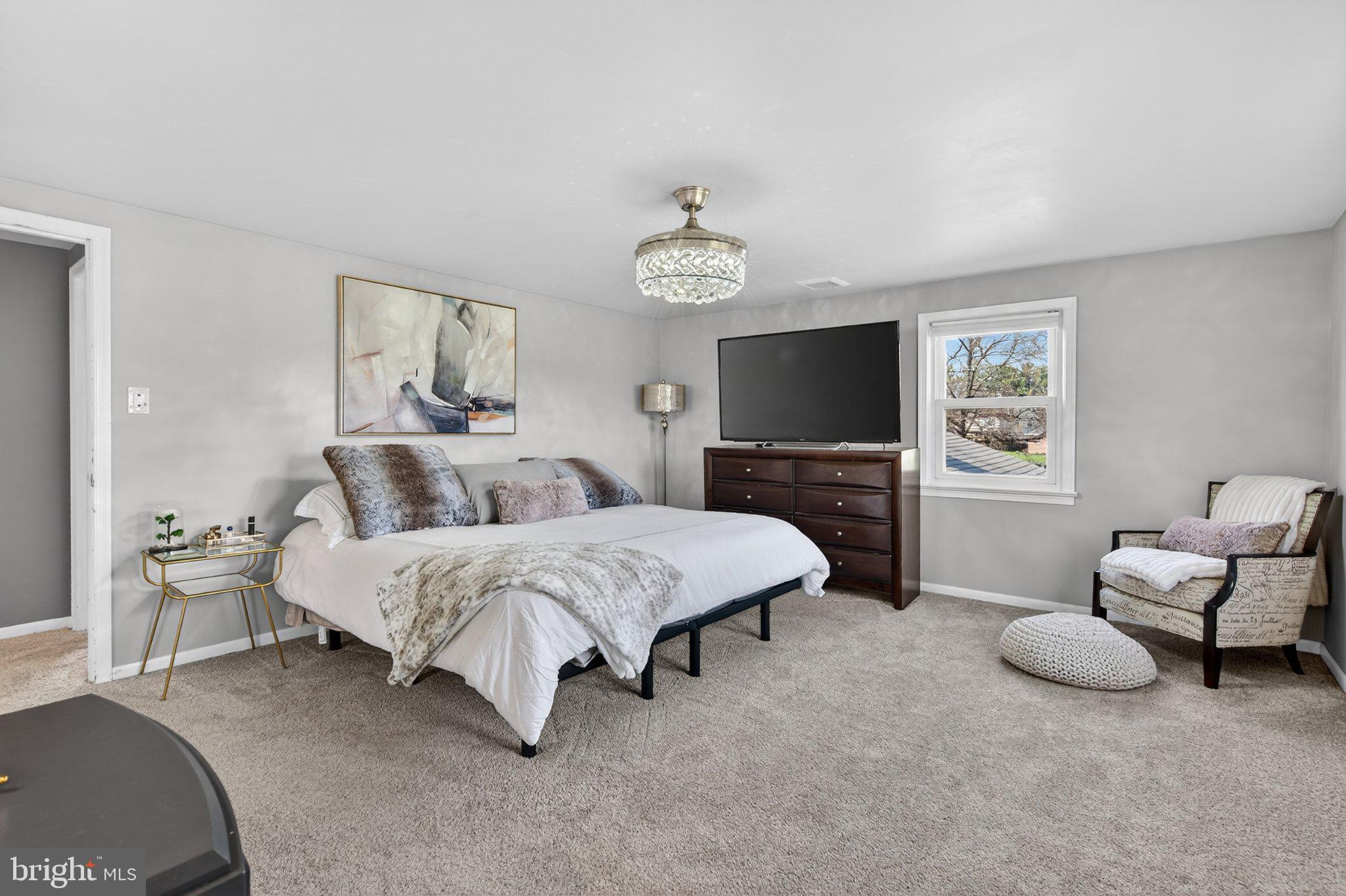 1100 South Valley Forge Road Lansdale, PA 19446 - Photo 17 of 43 Serene bedroom with modern elegance.