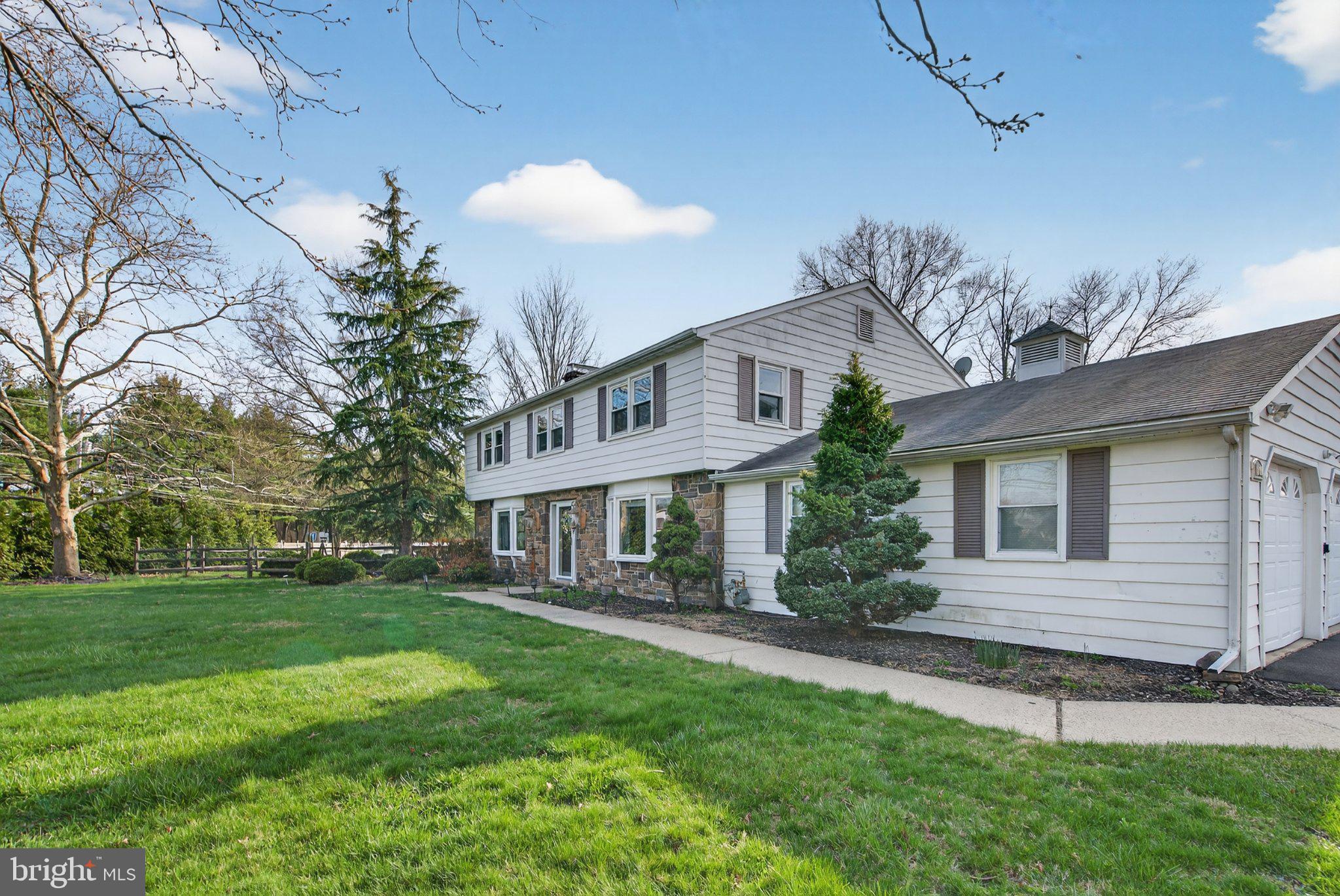 1100 South Valley Forge Road Lansdale, PA 19446 - Photo 2 of 43 Charming home with lush green surroundings.