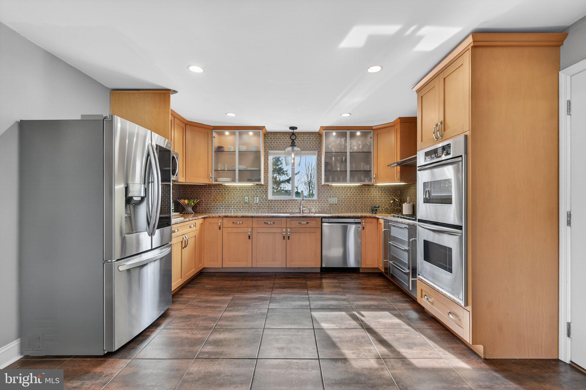 1100 South Valley Forge Road Lansdale, PA 19446 - Photo 6 of 43 Modern kitchen with warm wood tones.