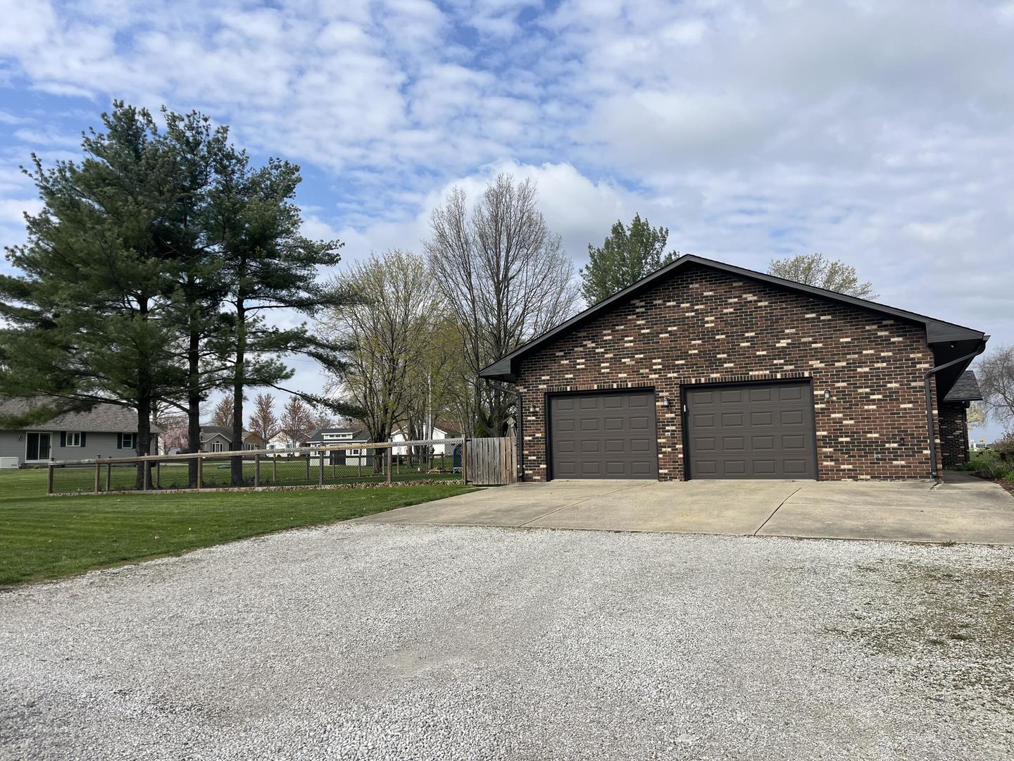 57 Jibby Estates Sullivan, IL 61951 - Photo 16 of 16 a front view of a house with yard and green space