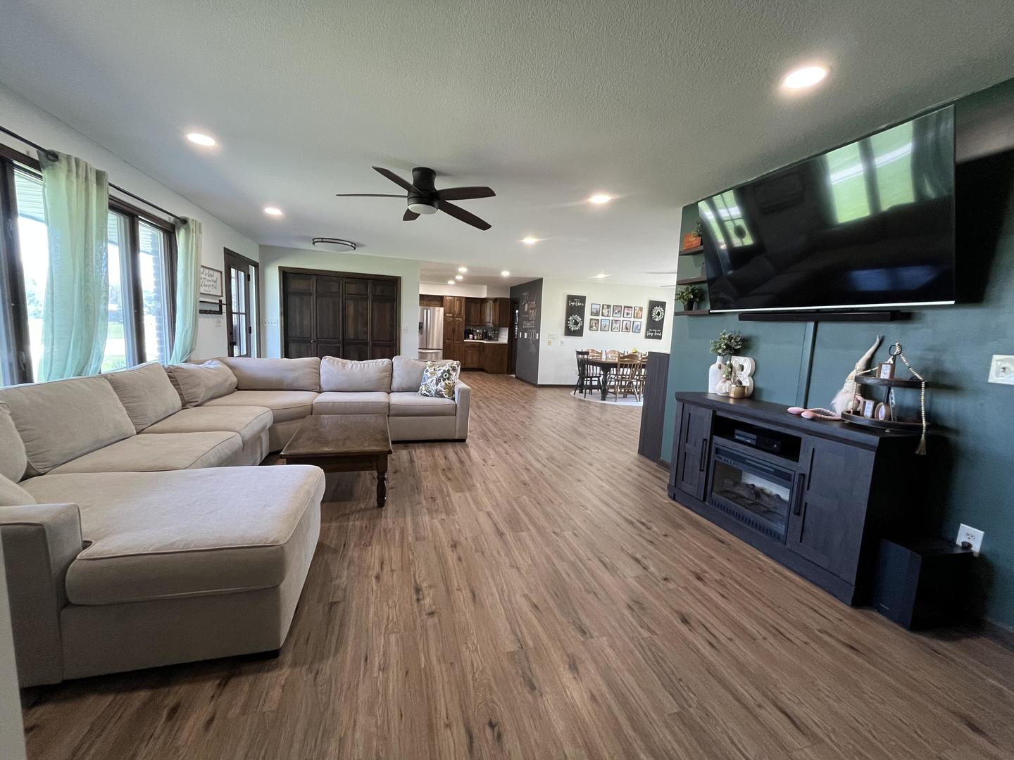 57 Jibby Estates Sullivan, IL 61951 - Photo 6 of 16 a living room with furniture and a flat screen tv