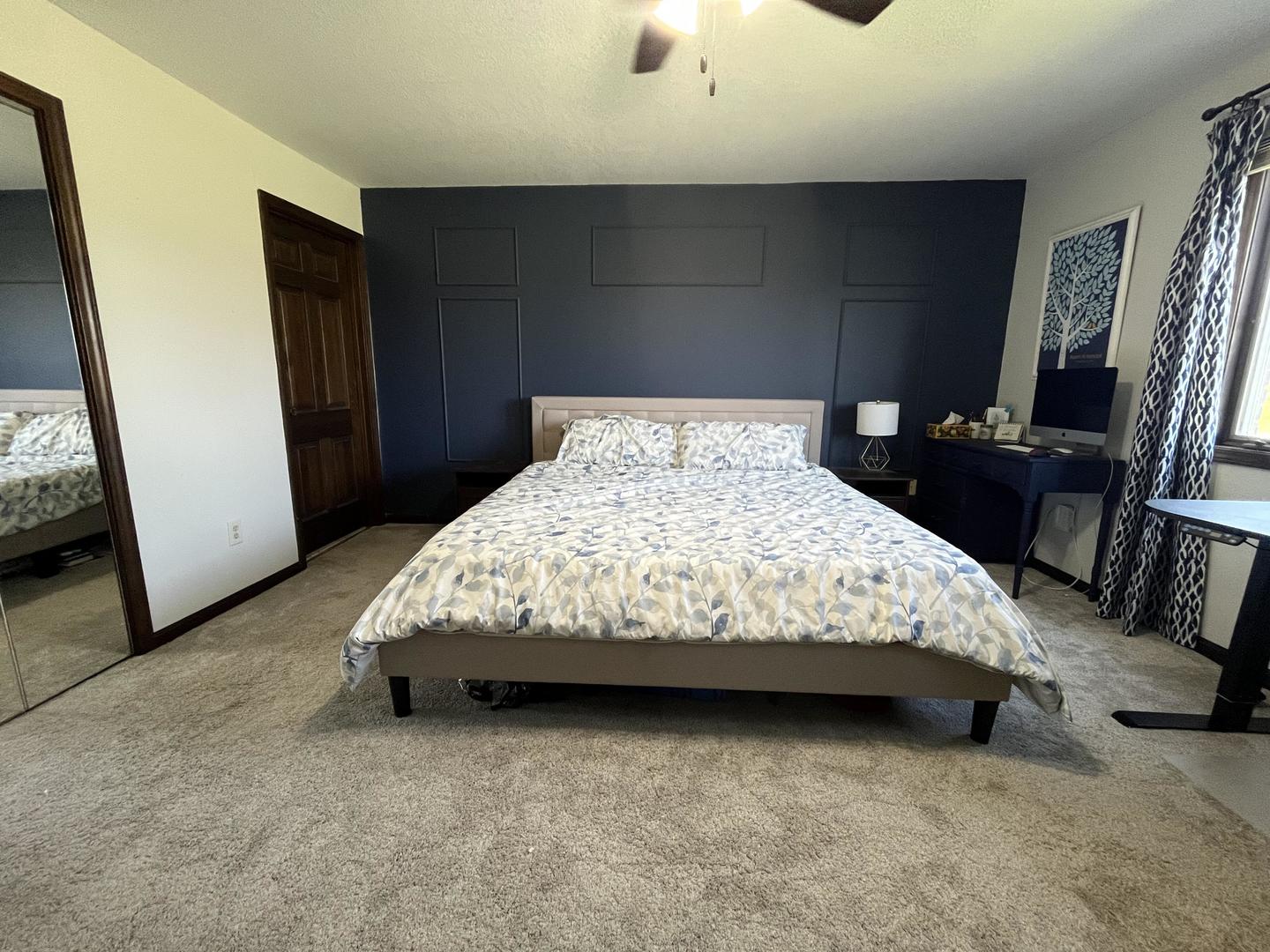 57 Jibby Estates Sullivan, IL 61951 - Photo 8 of 16 a bedroom with a bed and a flat tv screen on dresser