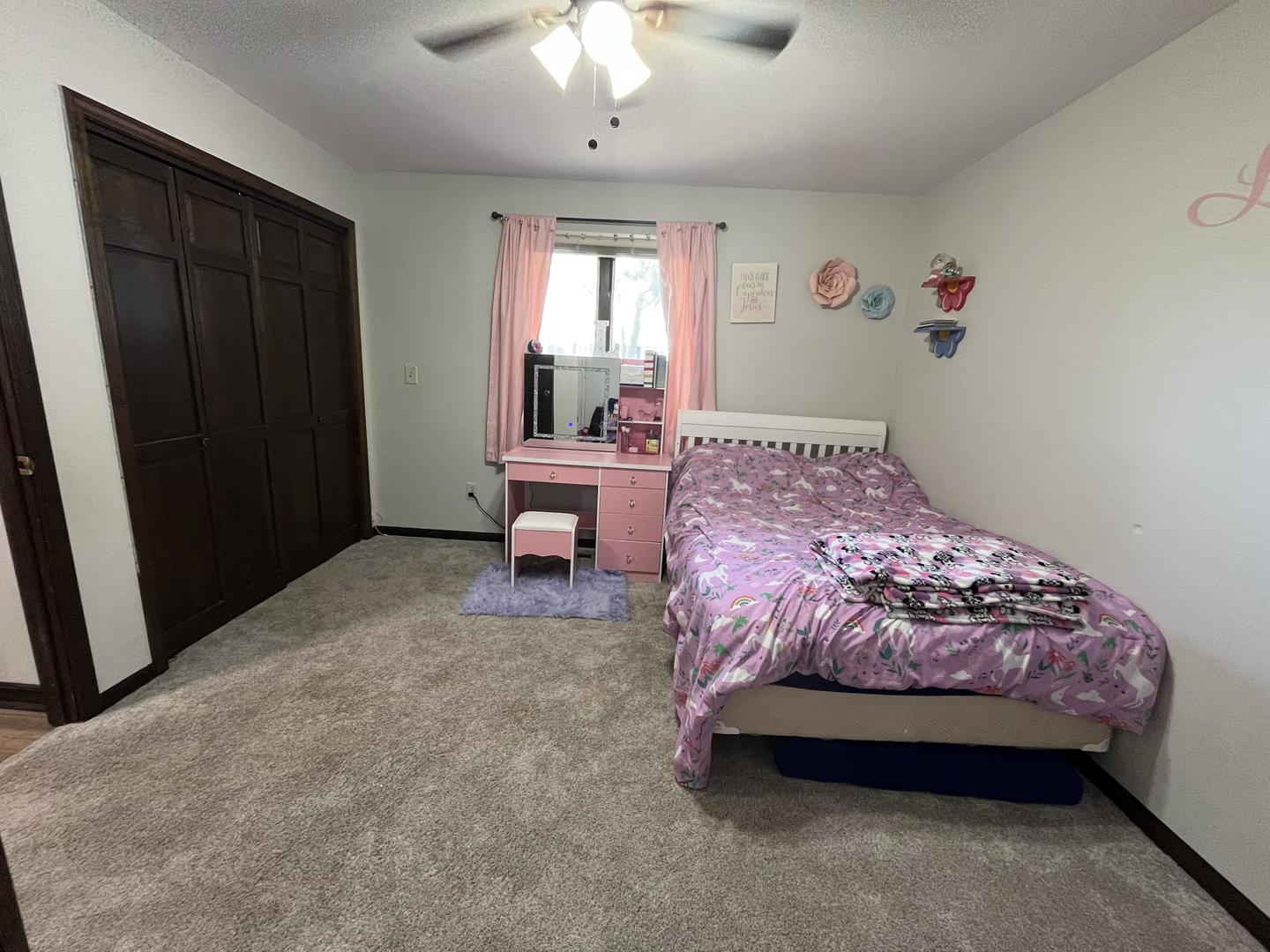 57 Jibby Estates Sullivan, IL 61951 - Photo 10 of 16 a bedroom with a bed and a window