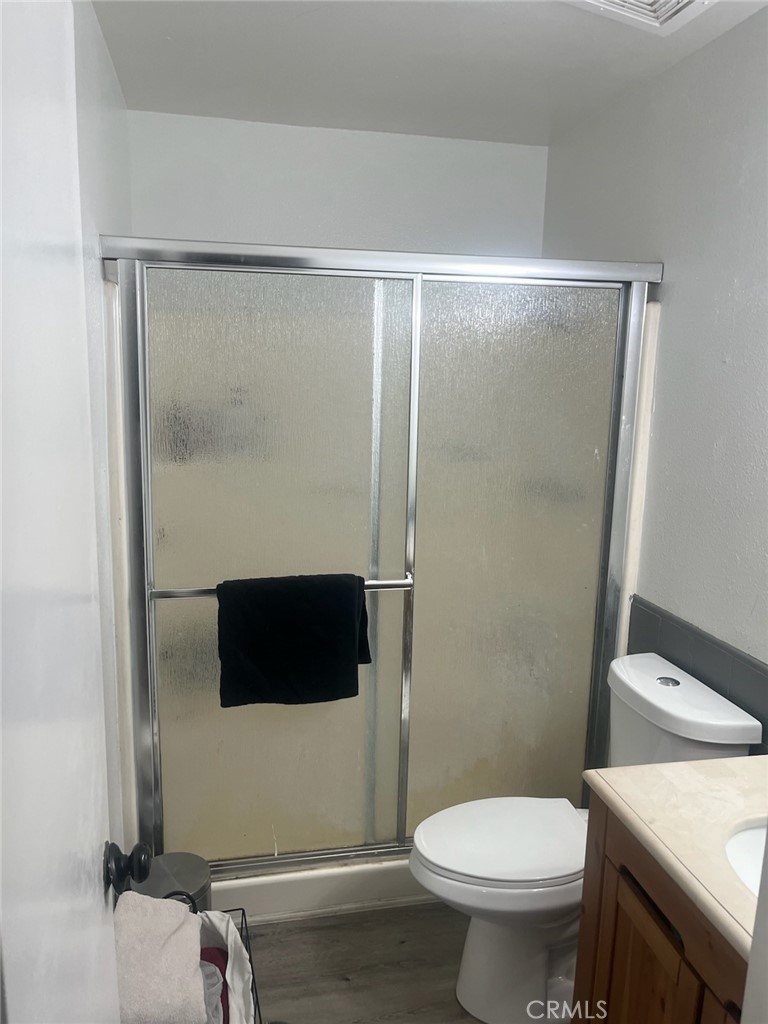 44706 Sarah Lane Lancaster, CA 93535 - Photo 14 of 17 a bathroom with a toilet and a shower