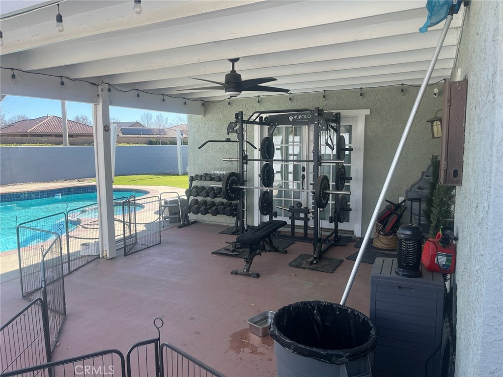 44706 Sarah Lane Lancaster, CA 93535 - Photo 15 of 17 a view of a room with gym equipment