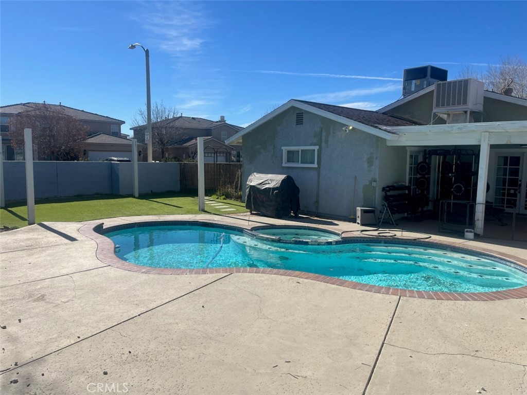 44706 Sarah Lane Lancaster, CA 93535 - Photo 17 of 17 a view of a house with a yard