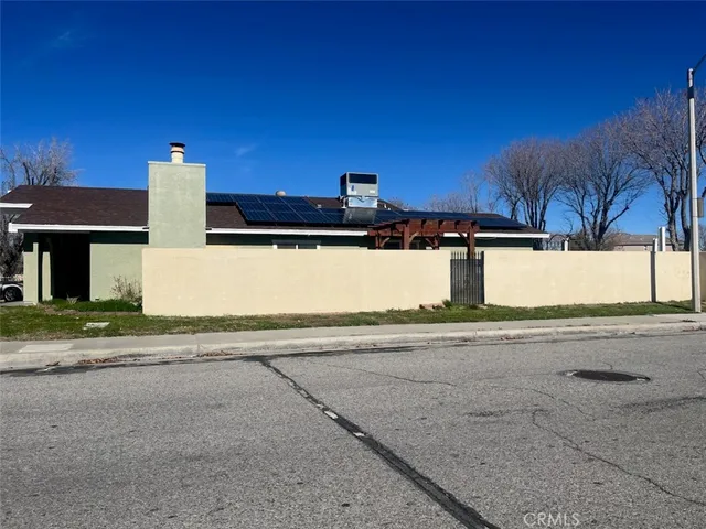 a front view of a house with street