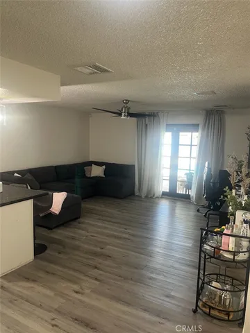 a room with gym equipment and a window