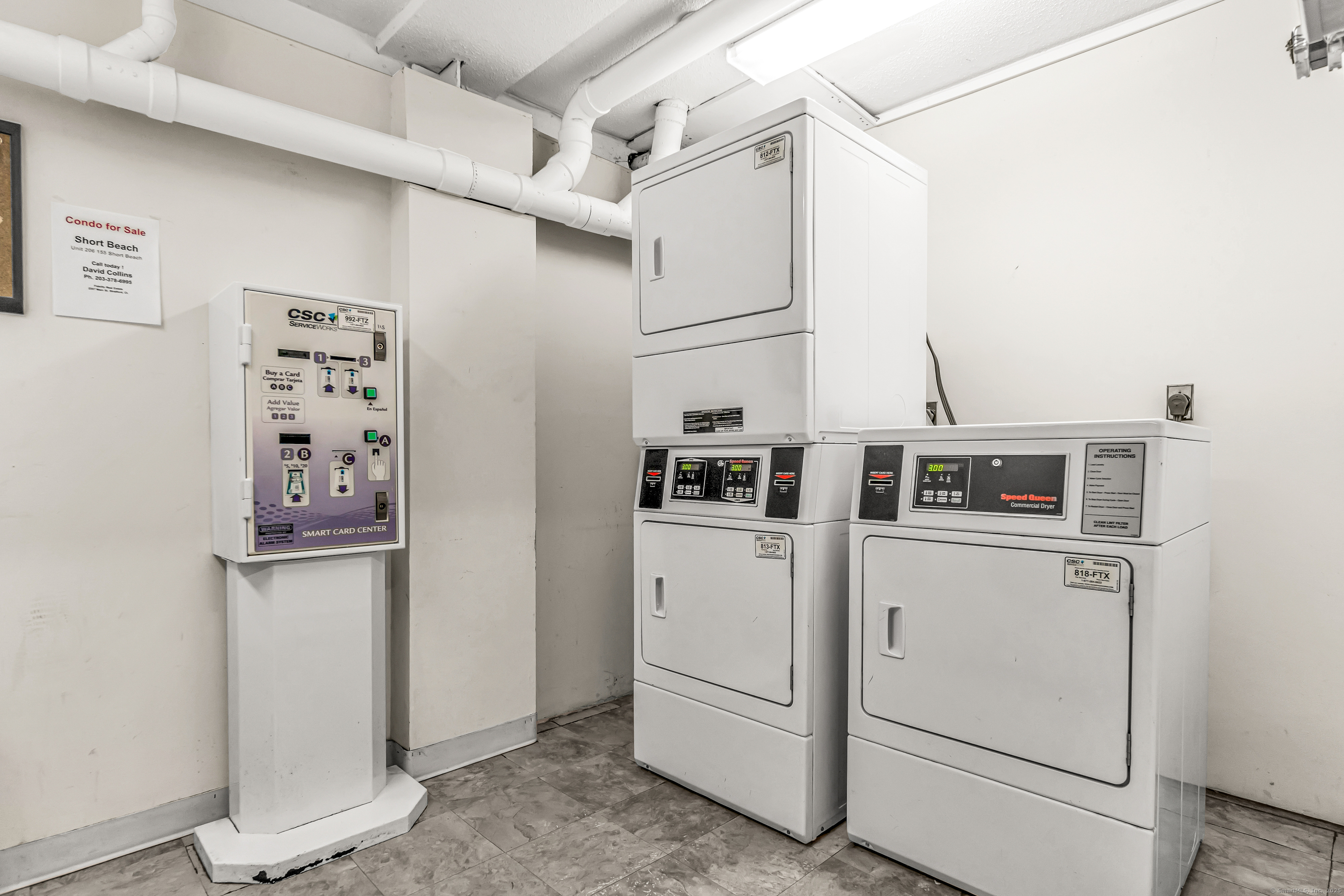 115 Short Beach Road, Unit 104 Stratford, CT 06615 - Photo 18 of 19 a utility room with dryer and washer