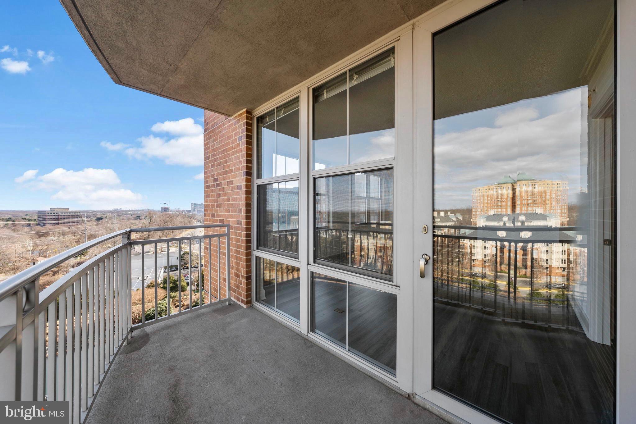 11800 Sunset Hills Road, Unit 1005 Reston, VA 20190 - Photo 16 of 42 Spacious balcony with pond views as well