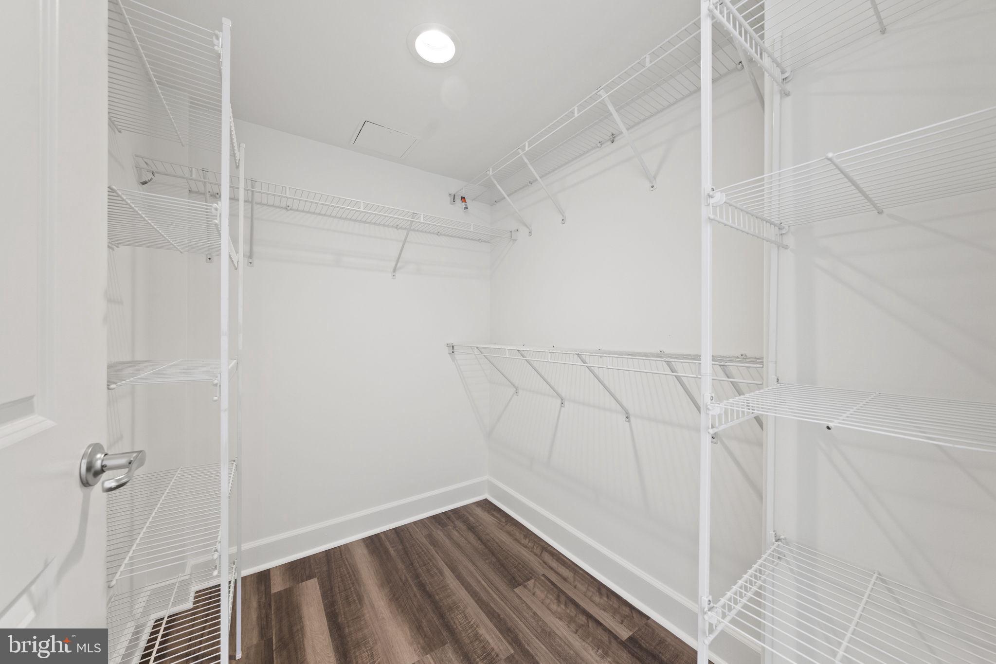 11800 Sunset Hills Road, Unit 1005 Reston, VA 20190 - Photo 10 of 42 Spacious bedroom walk-in closet