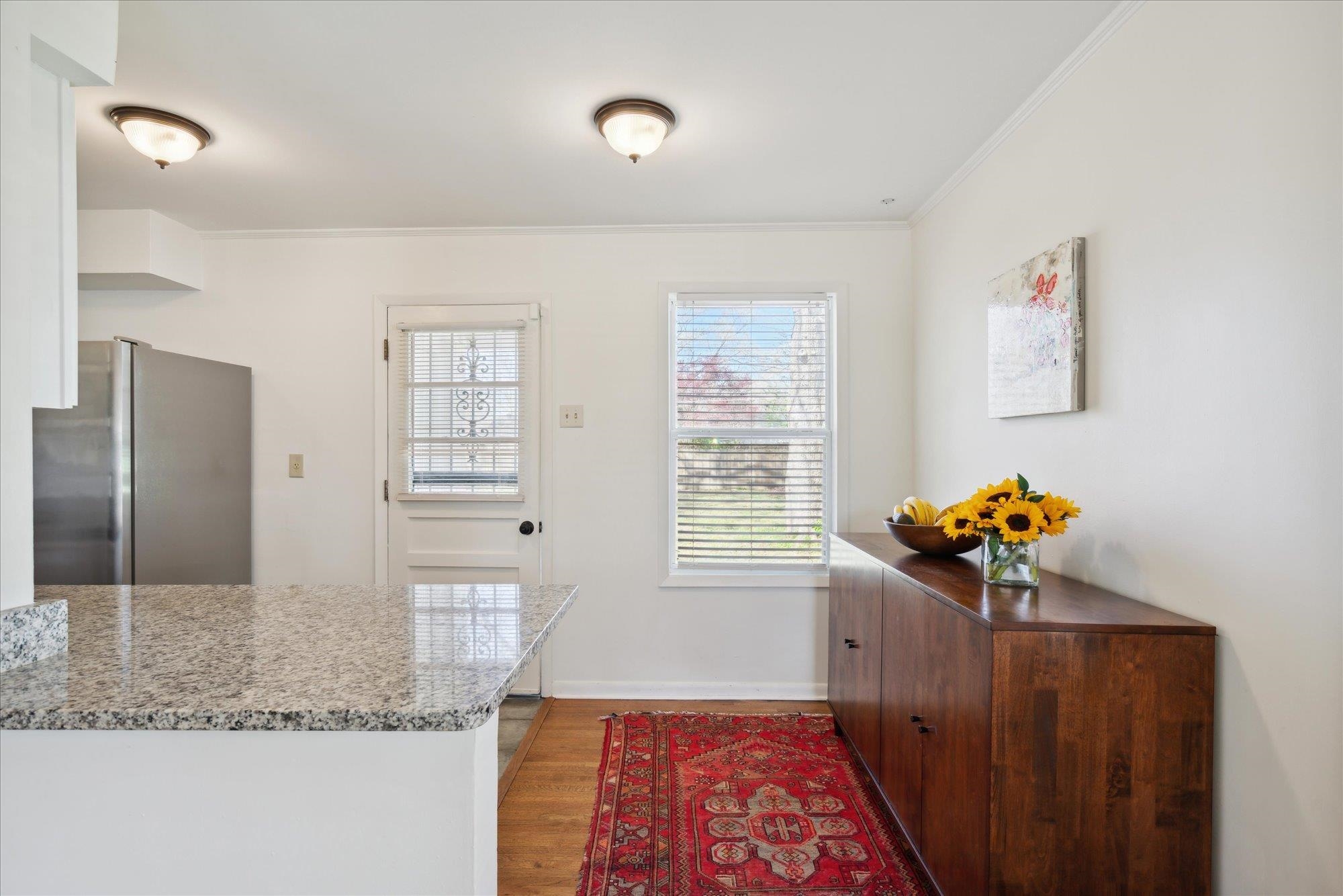 1529 Welsh Road Memphis, TN 38117 - Photo 11 of 27 a view of hallway with window and chandelier
