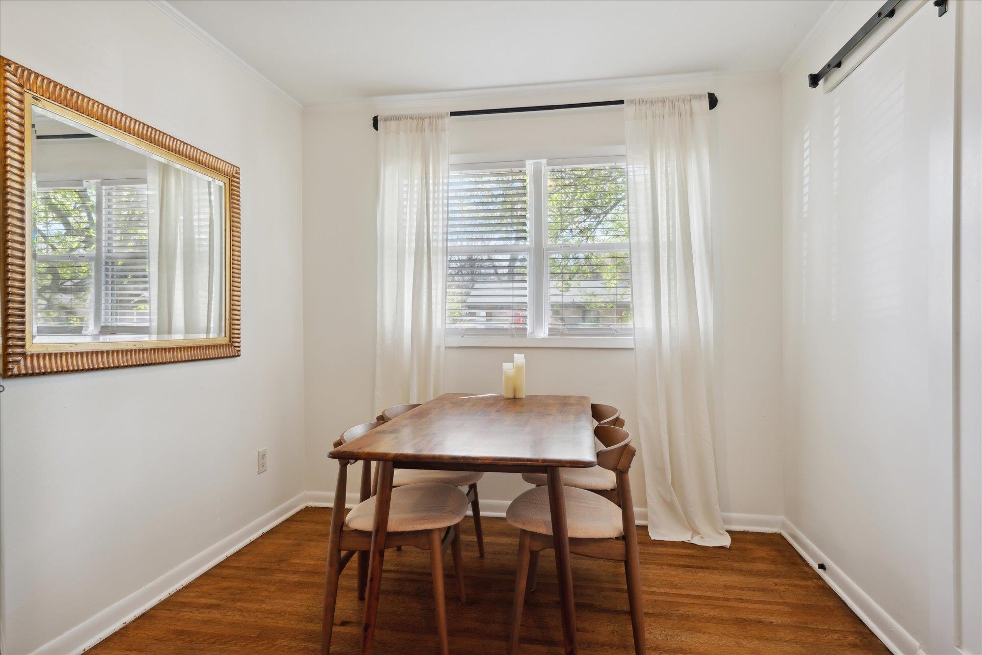 1529 Welsh Road Memphis, TN 38117 - Photo 16 of 27 a dining room with furniture and wooden floor