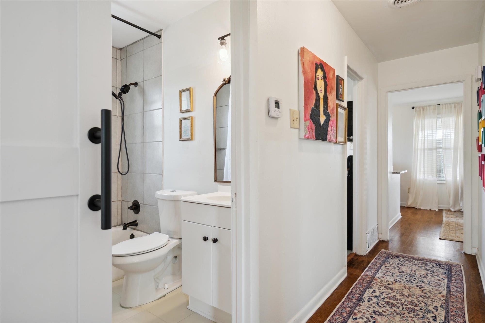 1529 Welsh Road Memphis, TN 38117 - Photo 19 of 27 a bathroom with a toilet sink and shower