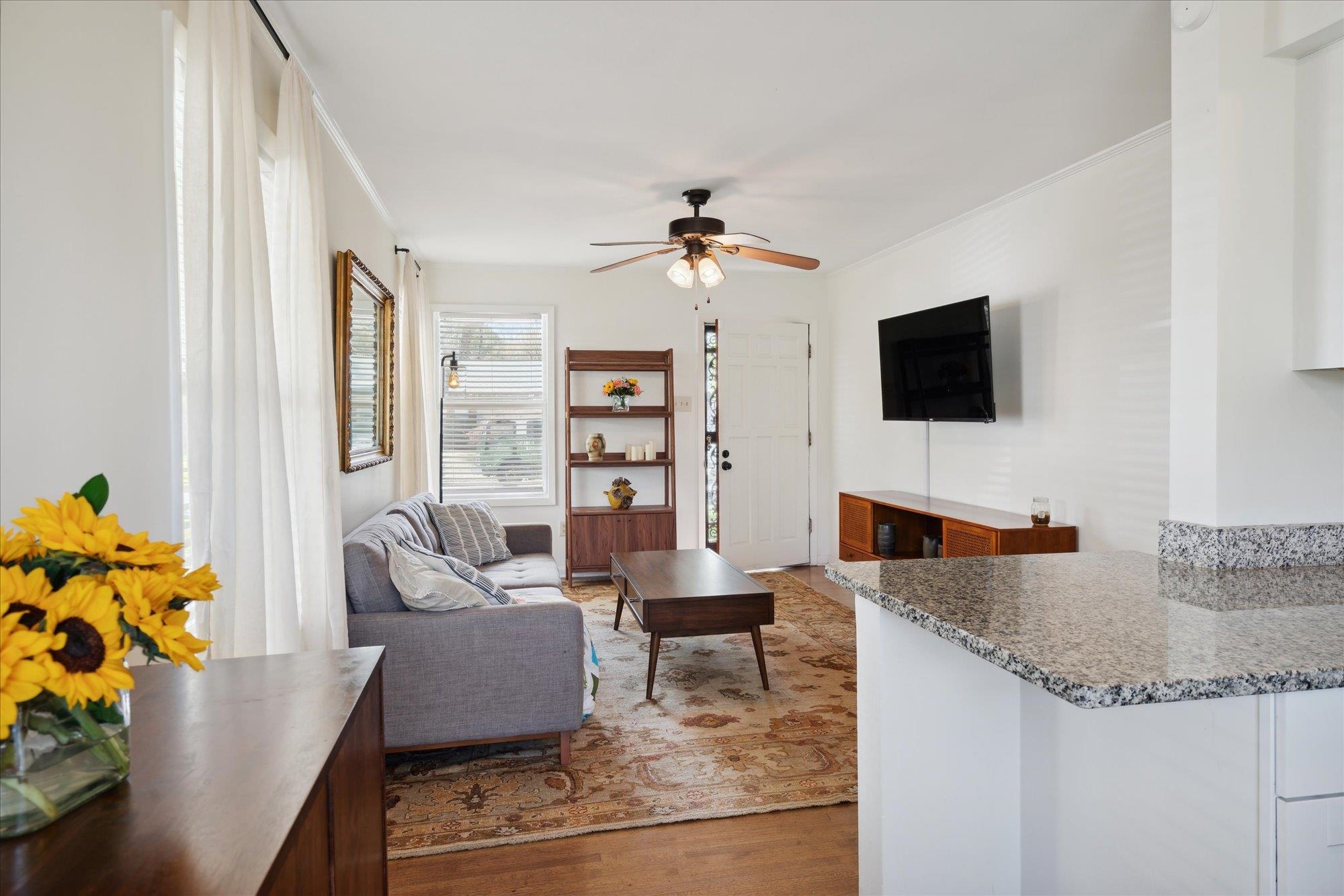 1529 Welsh Road Memphis, TN 38117 - Photo 10 of 27 a living room with fireplace furniture and a flat screen tv