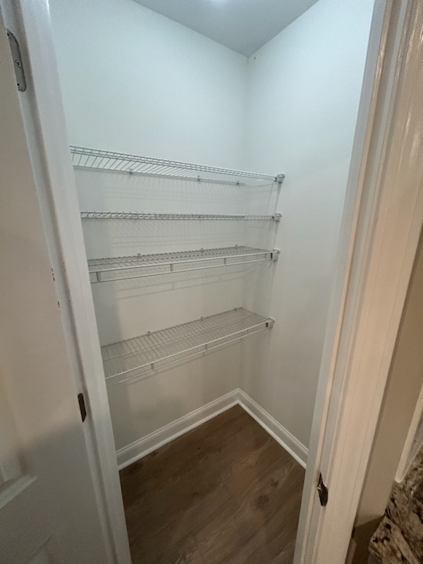 708 Hampton Street Iva, SC 29655 - Photo 12 of 14 Functional pantry offers ample storage with durable wire shelving.