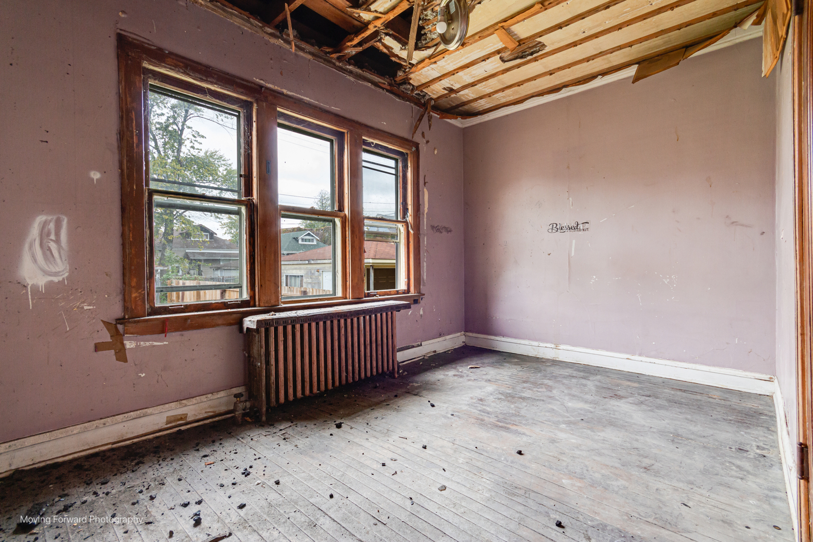 9222 South Ada Street Chicago, IL 60620 - Photo 11 of 25 a view of an empty room with a window