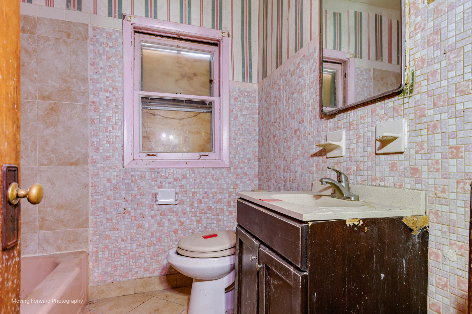 9222 South Ada Street Chicago, IL 60620 - Photo 15 of 25 a bathroom with a granite countertop sink toilet and mirror