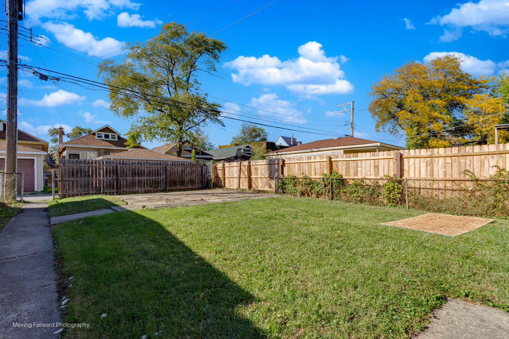 9222 South Ada Street Chicago, IL 60620 - Photo 4 of 25 a view of a porch with a garden