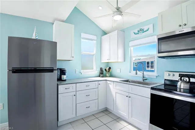 a bedroom with furniture and a wooden floor