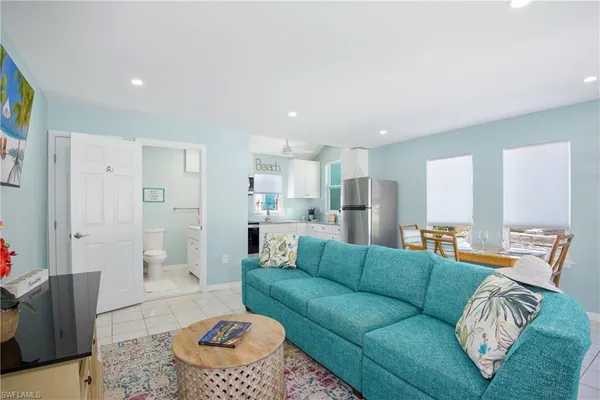 a living room with furniture and window