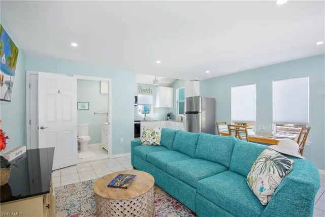 a living room with furniture and window