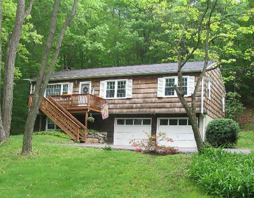 114 Chestnut Ridge Road Bethel, CT 06801 - Photo 1 of 1 a view of a house with a backyard porch and sitting area