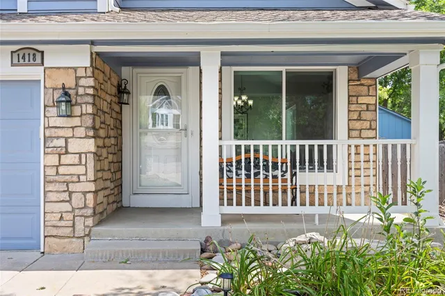 a front view of a house with a porch