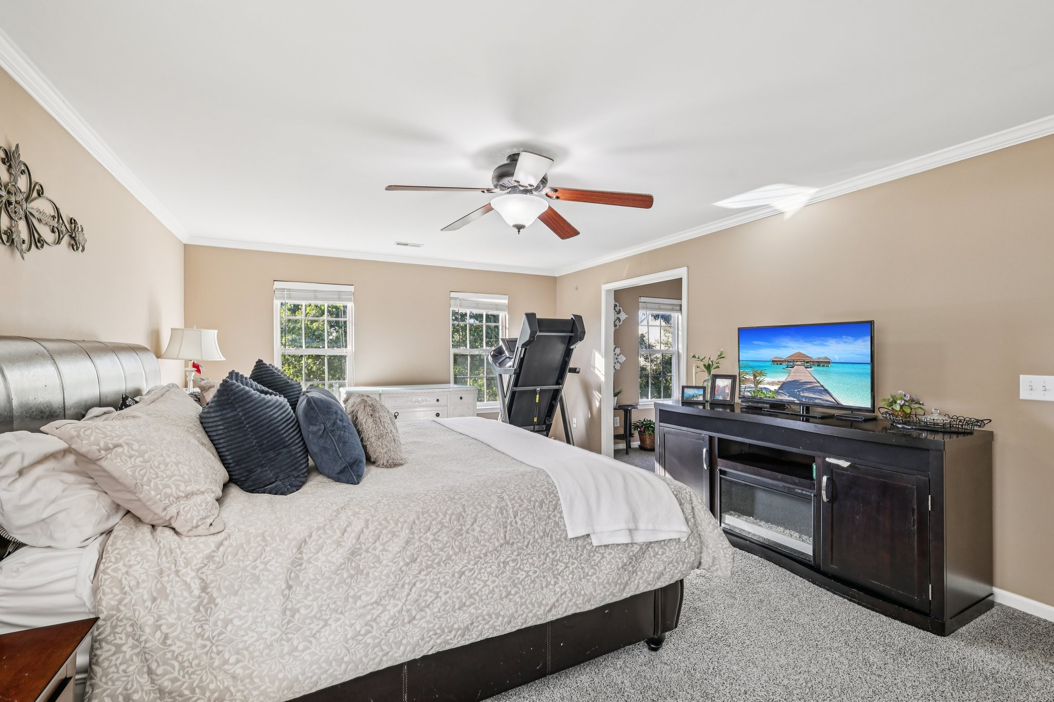 1613 Harrison Way Spring Hill, TN 37174 - Photo 20 of 38 a bedroom with a bed and a chandelier