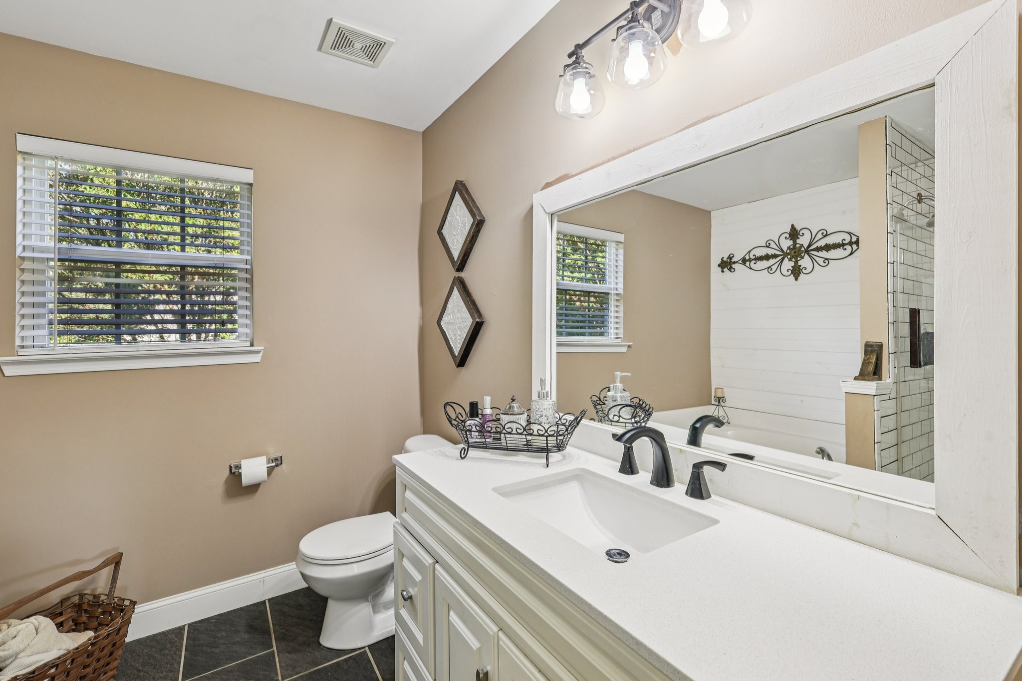 1613 Harrison Way Spring Hill, TN 37174 - Photo 22 of 38 a bathroom with a sink a toilet and shower