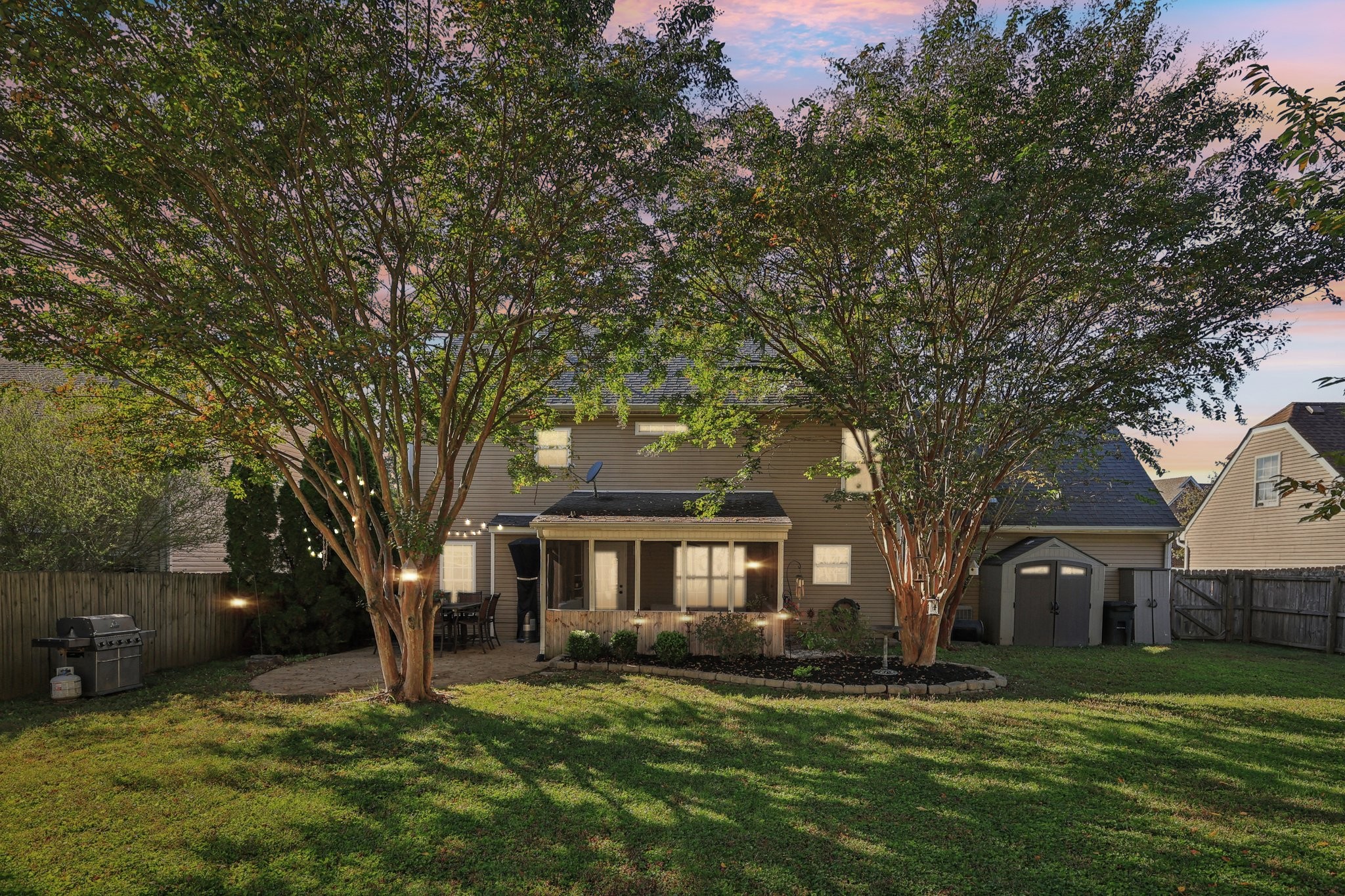 1613 Harrison Way Spring Hill, TN 37174 - Photo 35 of 38 a front view of a house with a garden