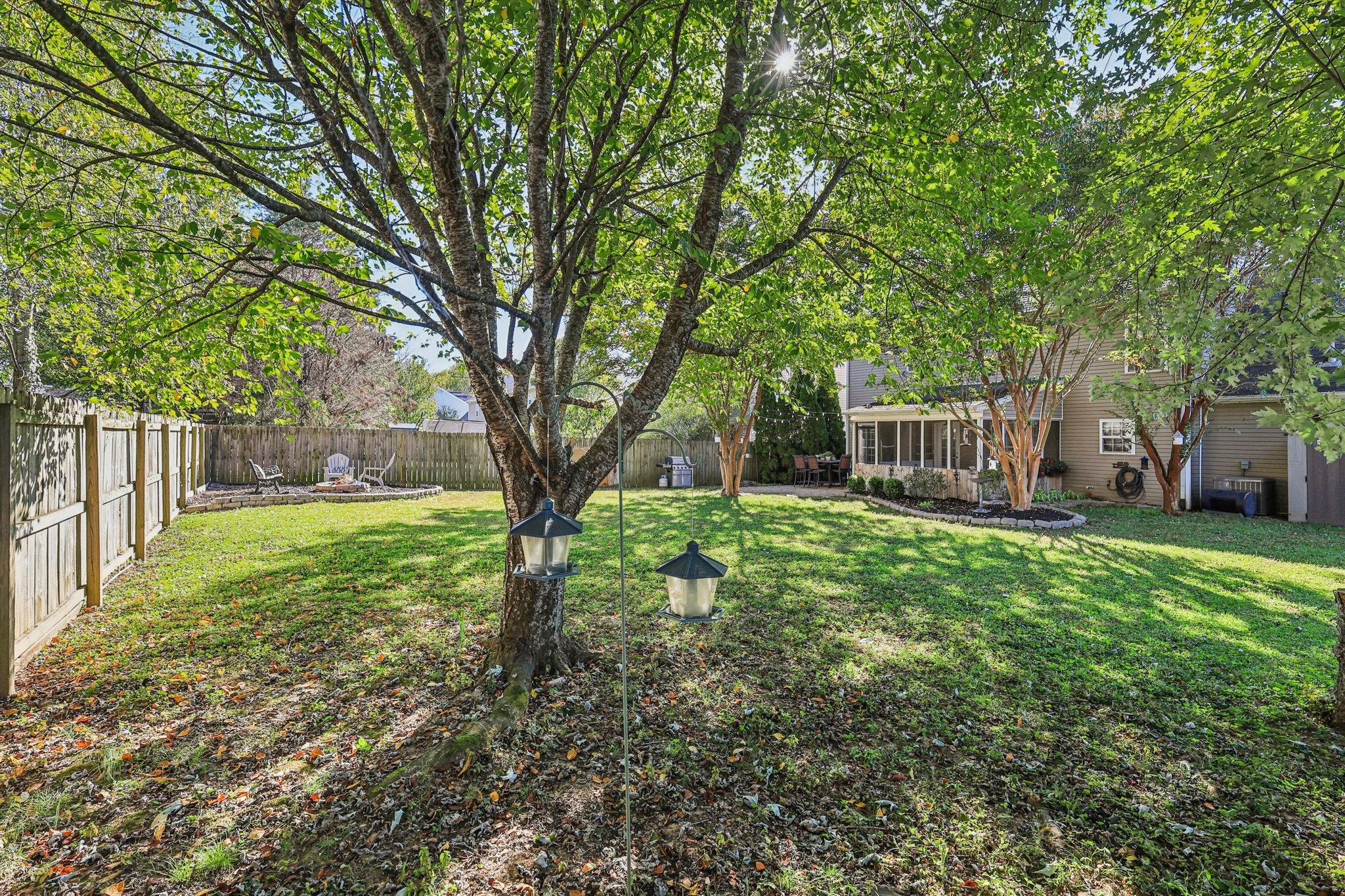 1613 Harrison Way Spring Hill, TN 37174 - Photo 38 of 38 a backyard of a house with lots of green space