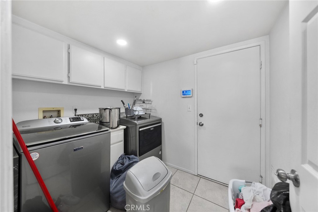 1494 Rabbit Peak Way Hemet, CA 92545 - Photo 21 of 45 a room with a storage and utility