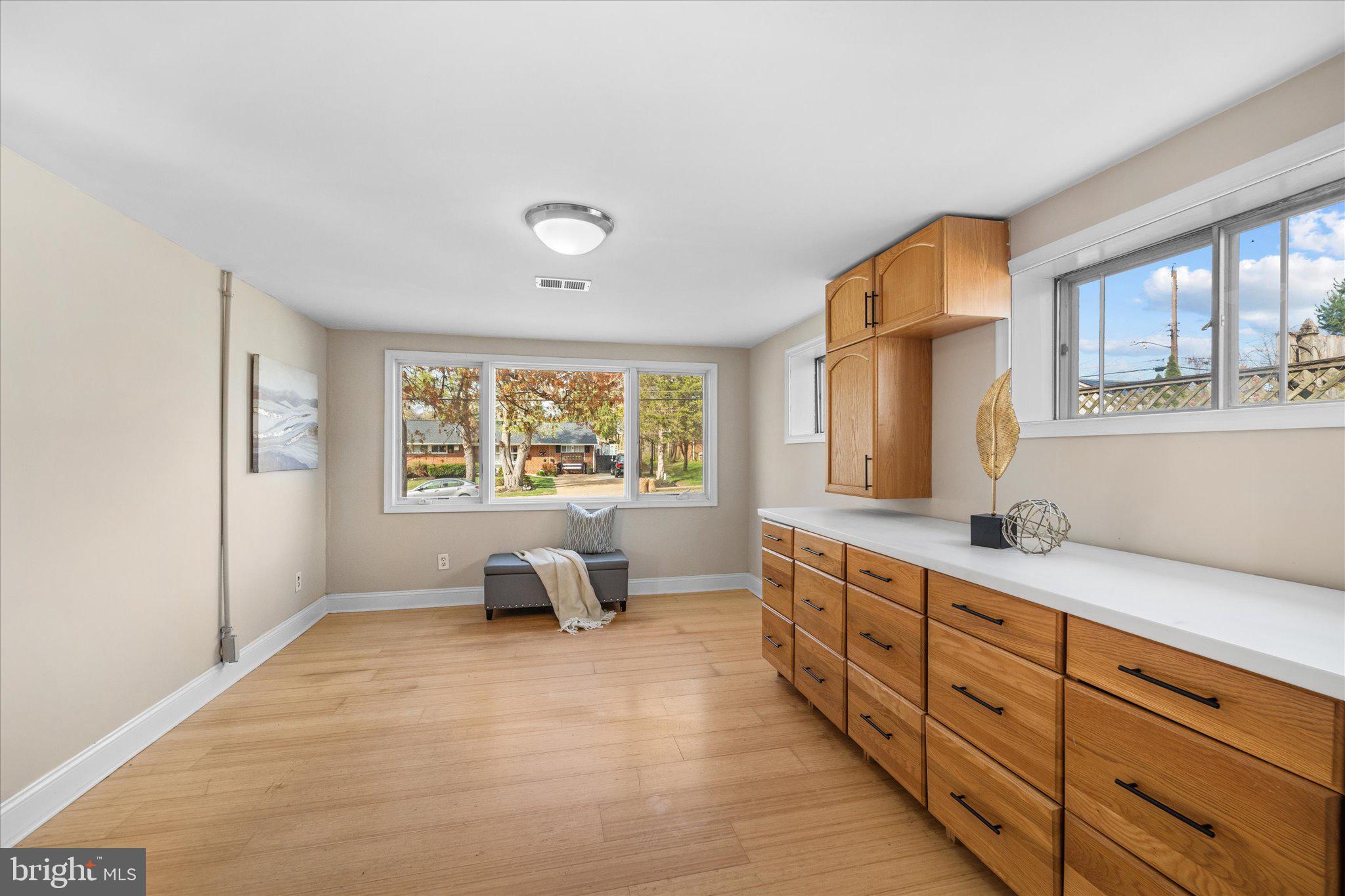 7312 Falmouth Street Springfield, VA 22150 - Photo 15 of 41 a spacious bedroom with a large bed and a window
