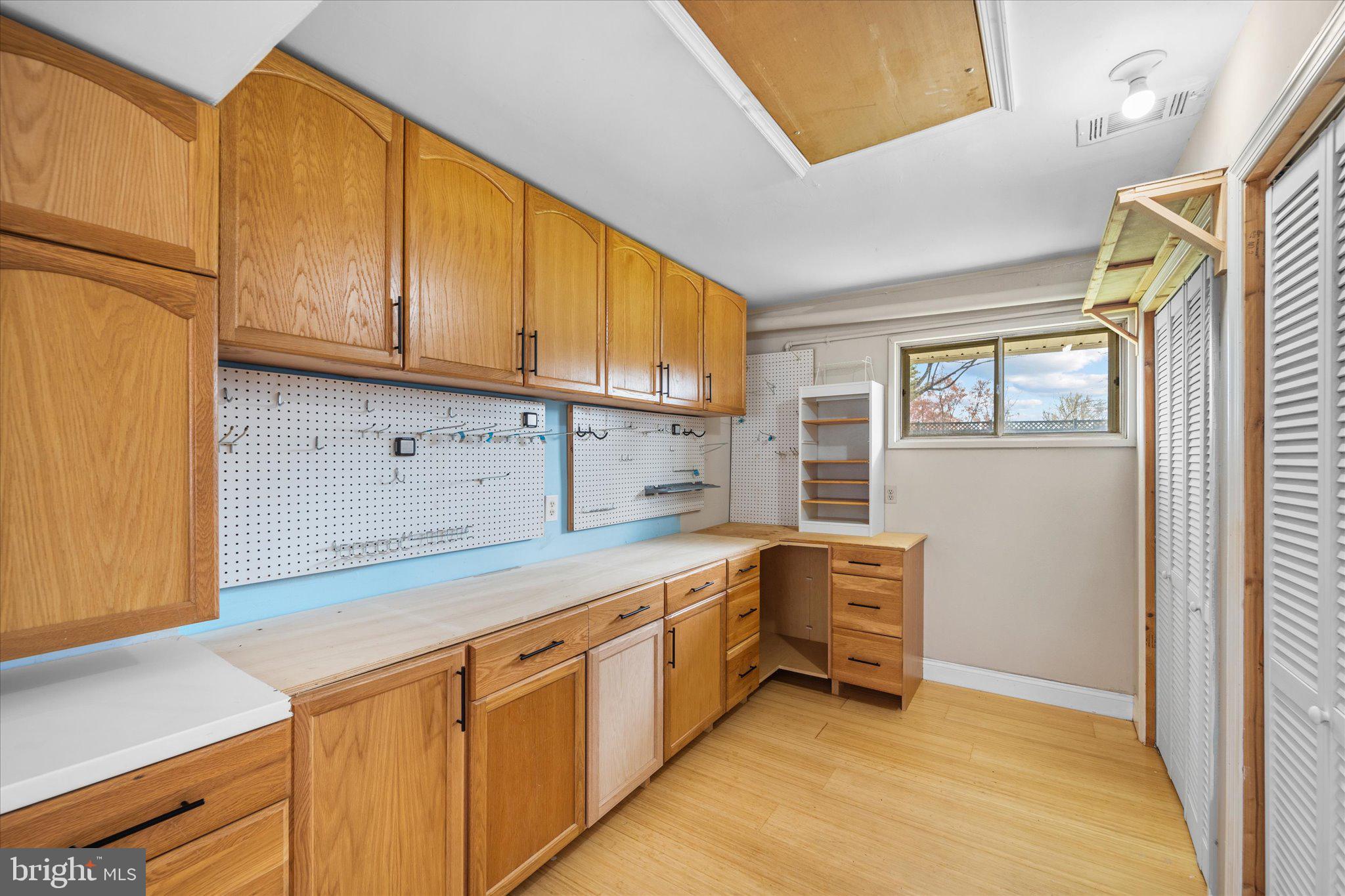 7312 Falmouth Street Springfield, VA 22150 - Photo 16 of 41 a kitchen with a stove a sink and a refrigerator
