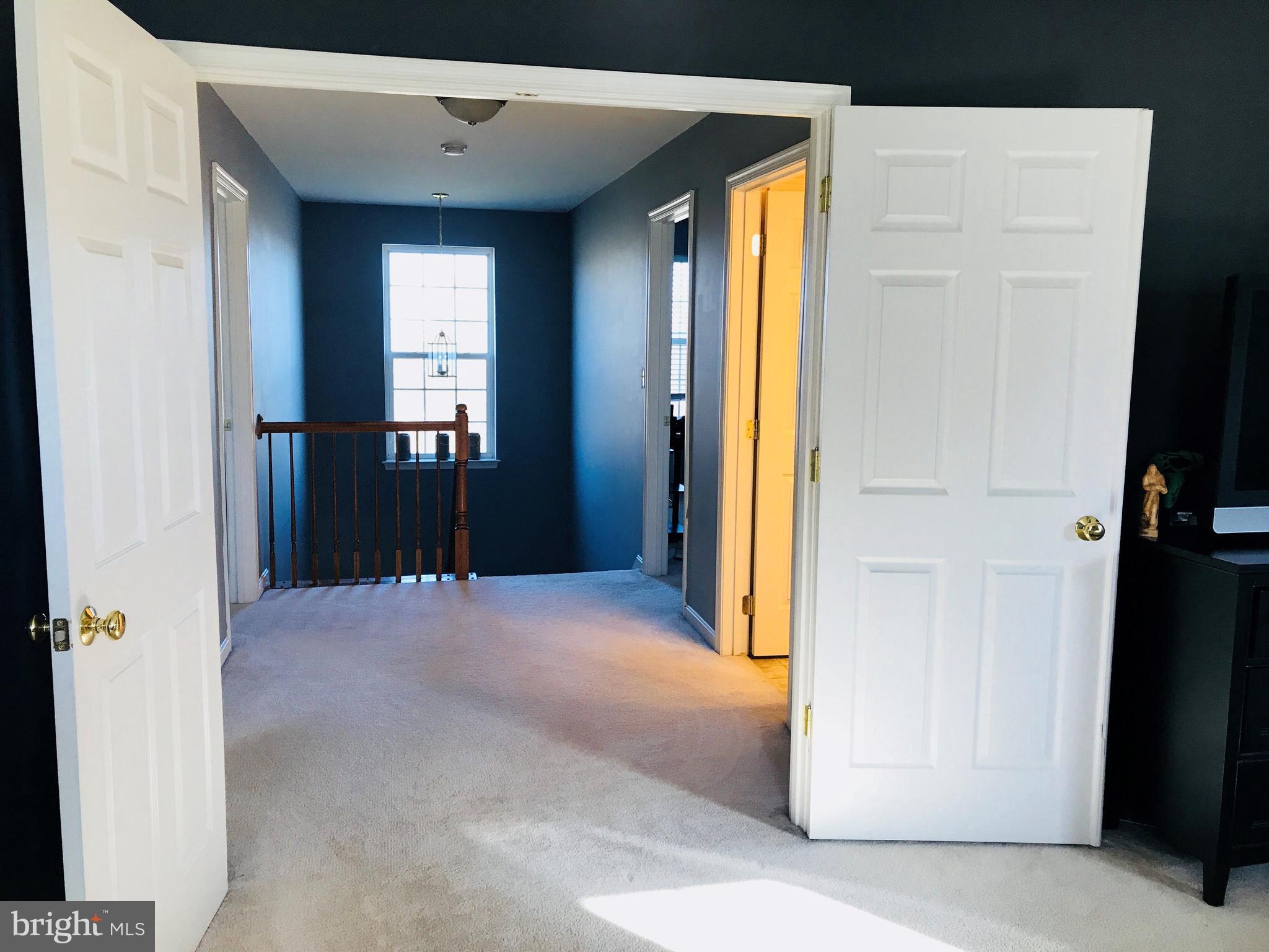 1435 Henshaw Road Inwood, WV 25428 - Photo 14 of 22 Master Bedroom to Hallway