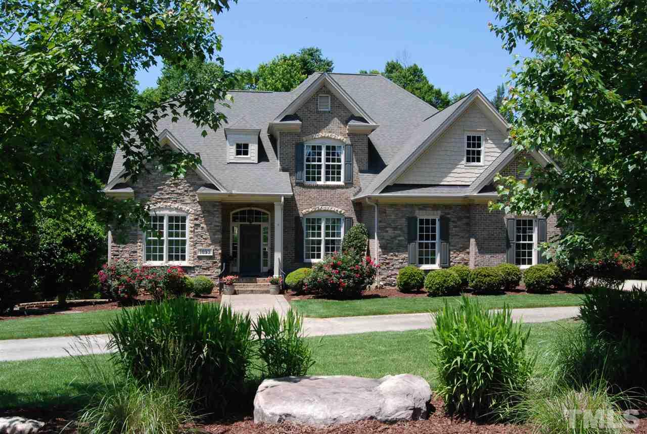 1093 Tacketts Pond Drive Raleigh, NC 27614 - Photo 1 of 25 a front view of a house with a yard