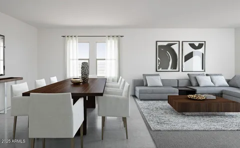 a kitchen with stainless steel appliances granite countertop a refrigerator a stove a sink a microwave and a refrigerator