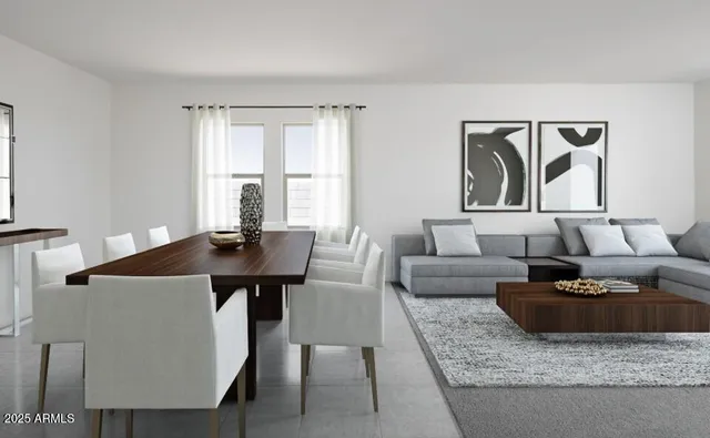 a kitchen with stainless steel appliances granite countertop a refrigerator a stove a sink a microwave and a refrigerator