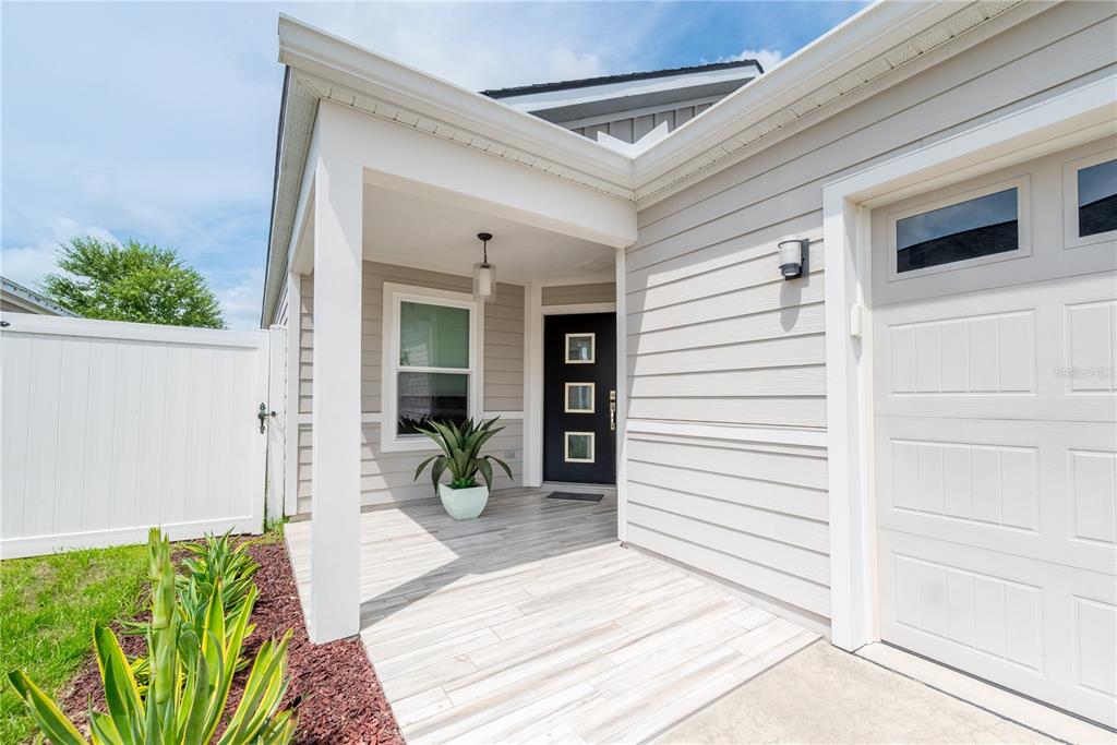 1790 Southwest 247th Street Newberry, FL 32669 - Photo 2 of 44 a view of a entryway front of house