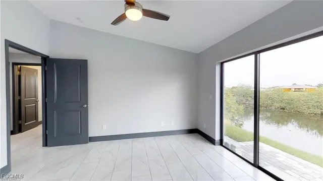 a view of an empty room and window