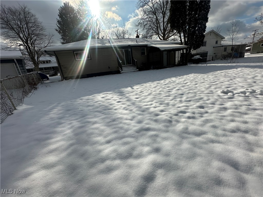 603 Liberty Road Youngstown, OH 44505 - Photo 40 of 42 Snow covered house featuring entry steps