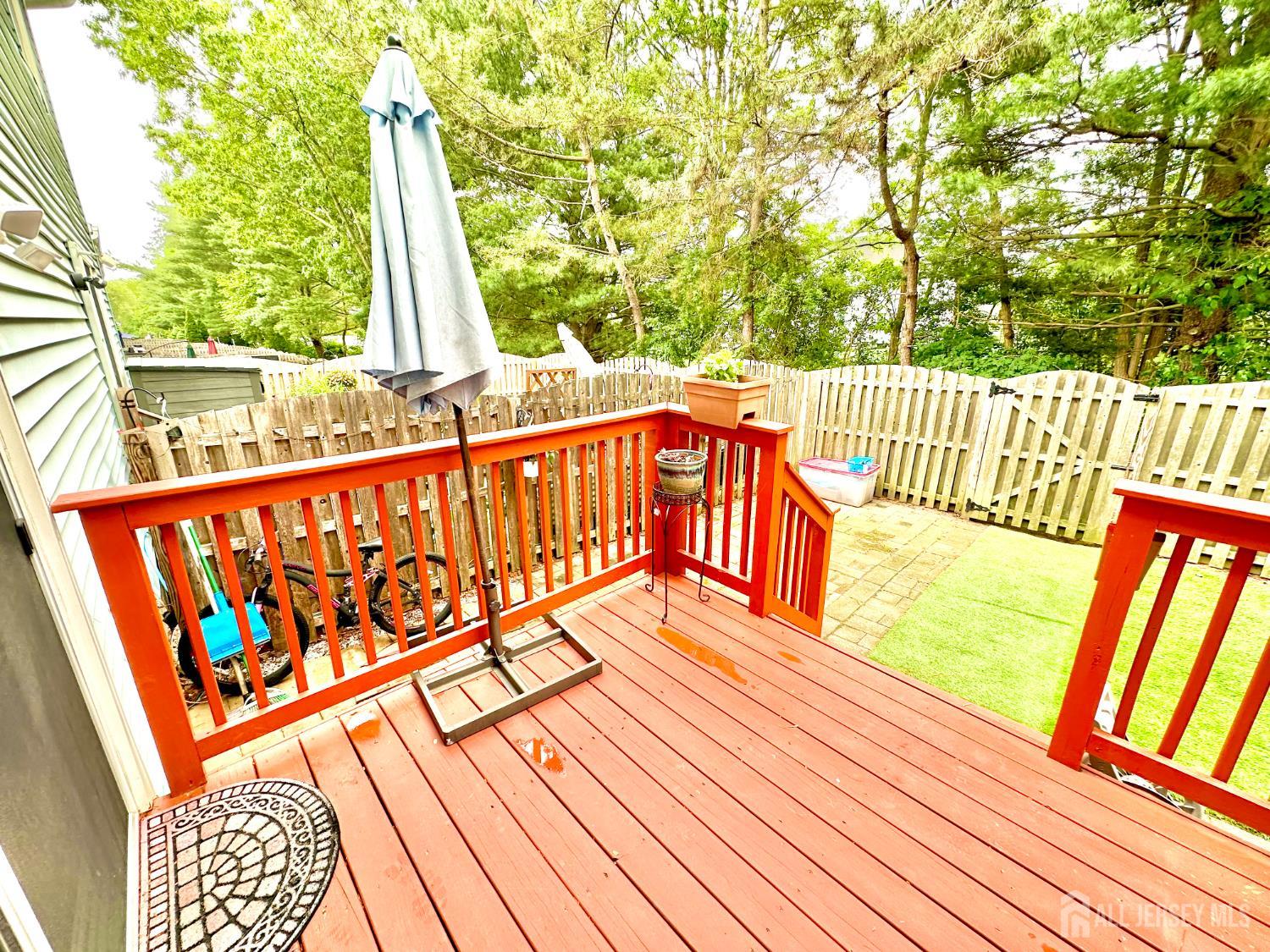 41 Brookview Circle Jamesburg, NJ 08831 - Photo 16 of 38 a balcony with wooden floor and in a balcony