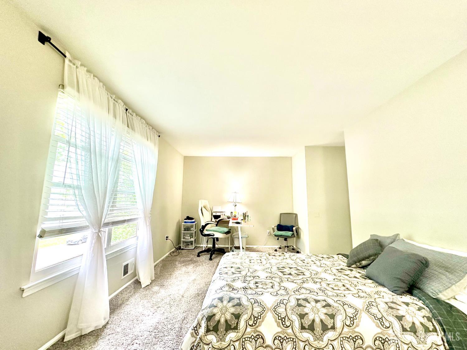 41 Brookview Circle Jamesburg, NJ 08831 - Photo 23 of 38 a bed room with a bed and a chair