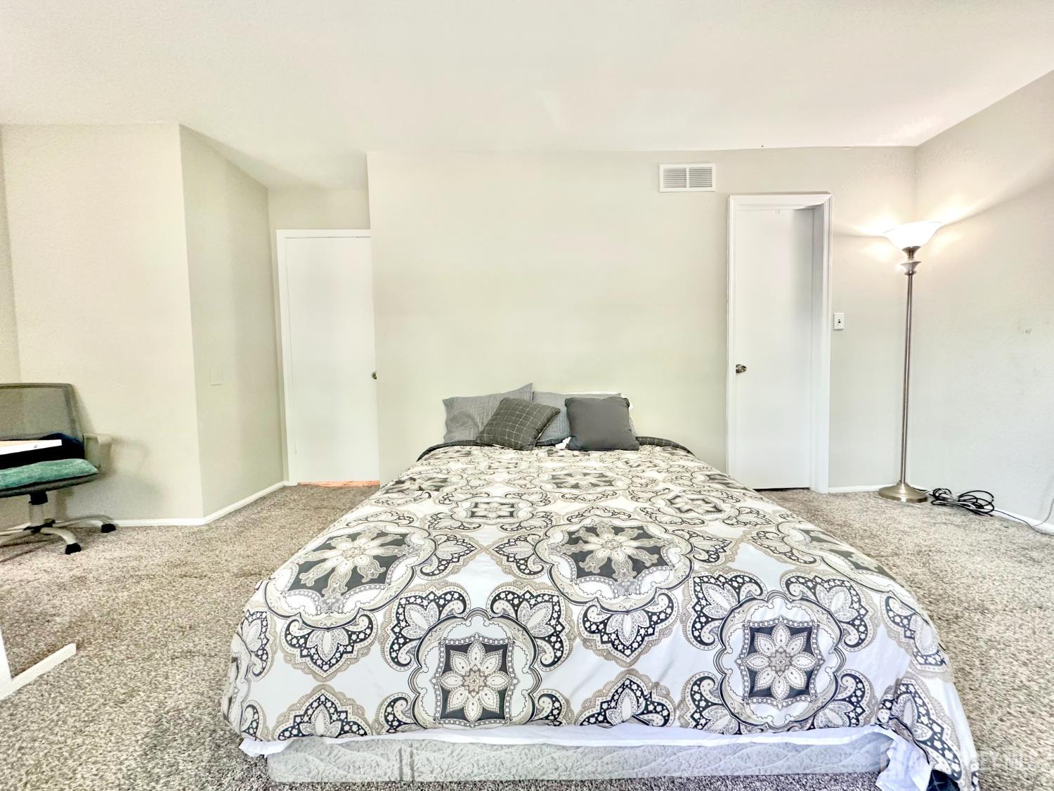 41 Brookview Circle Jamesburg, NJ 08831 - Photo 25 of 38 a bedroom with a bed and wooden floor