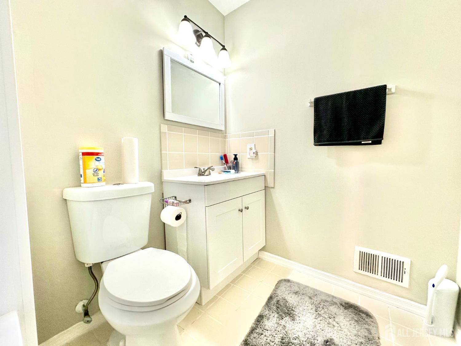 41 Brookview Circle Jamesburg, NJ 08831 - Photo 29 of 38 a bathroom with a sink toilet and shower